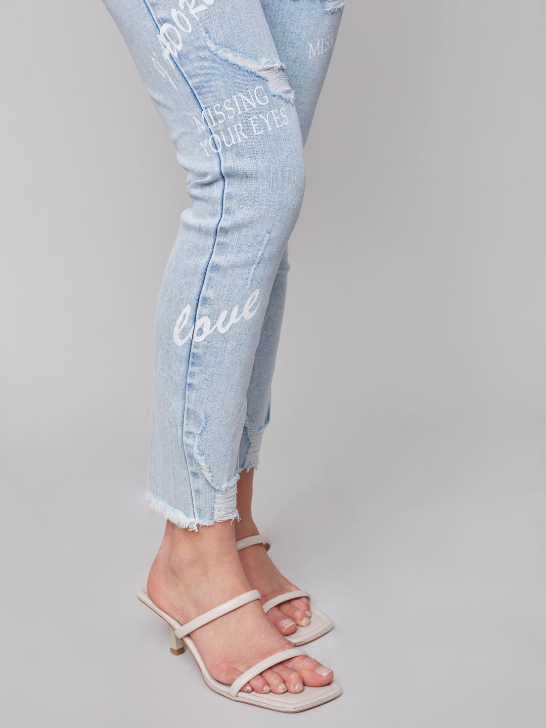 Mid Rise Distressed Skinny Jean